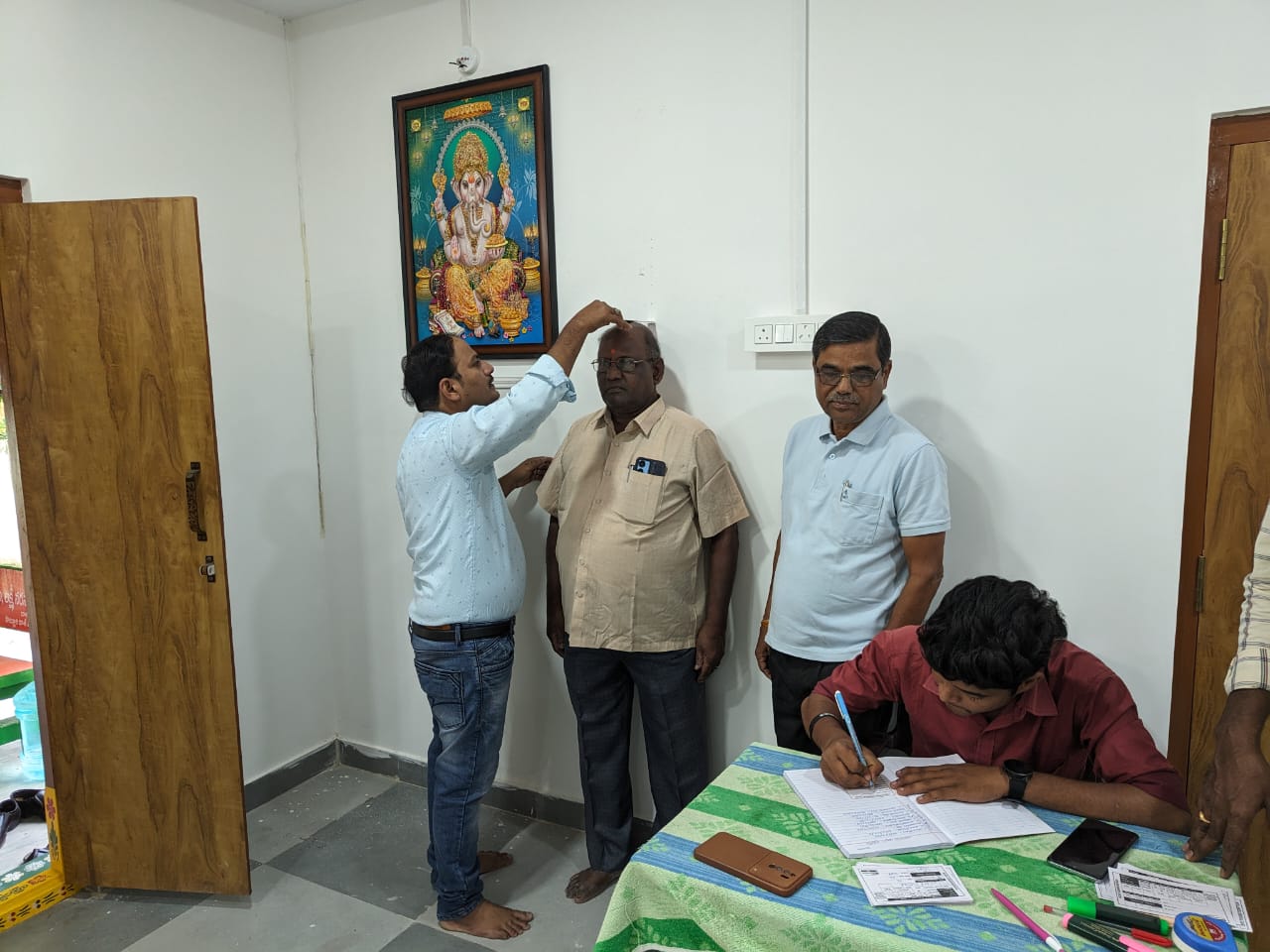 Measuring height at Wellness camp on 27-10-2024